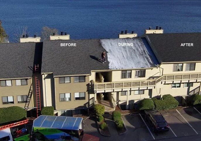 A man is on the roof of a building